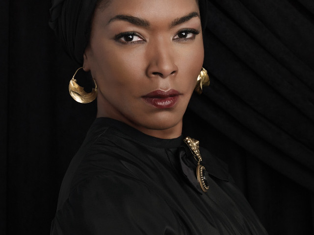 Woman black shirt gold earrings #2 free wallpaper for desktop - medium preview image