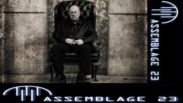 Man sitting chair building sign free wallpaper for desktop - medium preview image