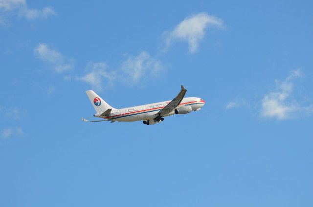 Jetliner flying blue sky clouds #16 free wallpaper for desktop - medium preview image