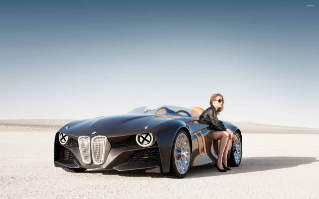 Woman sitting black car desert free wallpaper for desktop - medium preview image