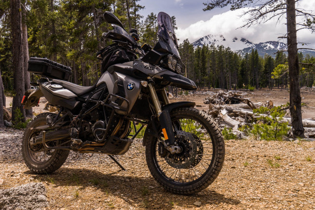 Motorcycle dirtroad woods mountain bridge free wallpaper for desktop - medium preview image