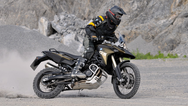 Man motorcycle dirtroad mountainside helmet free wallpaper for desktop - medium preview image