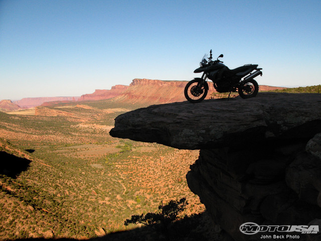 Motorcycle cliff valley mountains blue free wallpaper for desktop - medium preview image