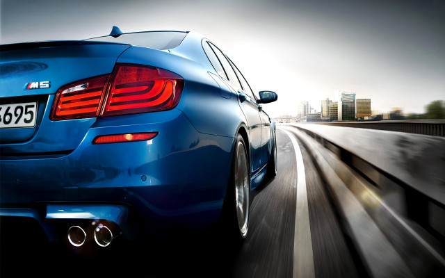 Blue car highway city skyline free wallpaper for desktop - medium preview image