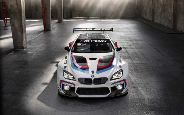 Bmw race car parking garage free wallpaper for desktop - medium preview image