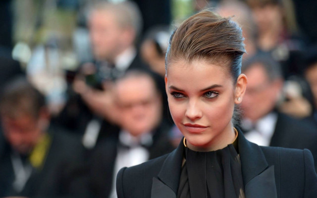 Woman high bun black suit free wallpaper for desktop - medium preview image