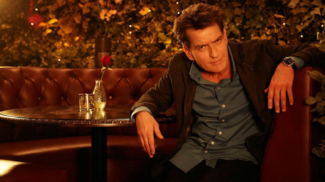 Man sitting table bottle wine #2 free wallpaper for desktop - medium preview image