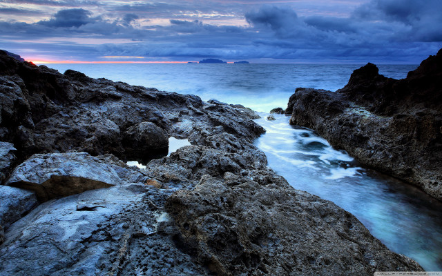 Rocky shore body of water free wallpaper for desktop - medium preview image