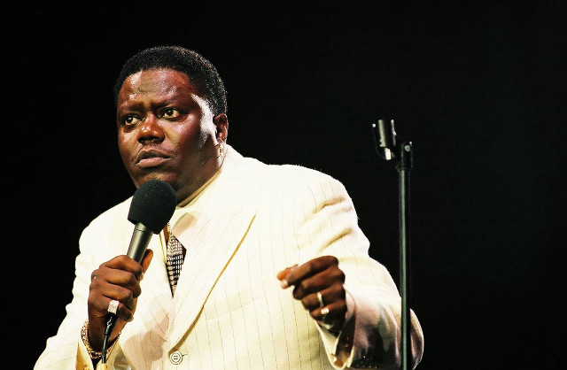 Man suit microphone serious look free wallpaper for desktop - medium preview image