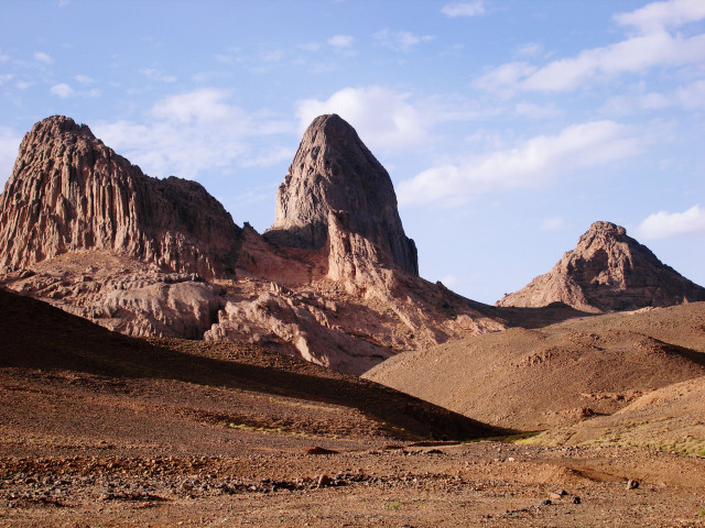 Mountain range rocks clouds sky free wallpaper for desktop - medium preview image