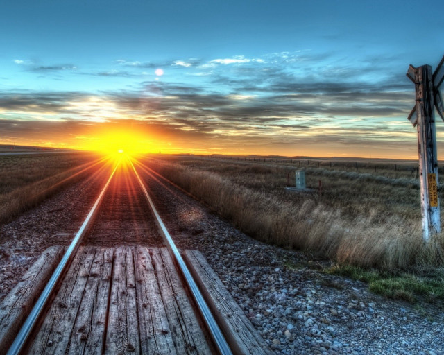 Train track sunset field grass free wallpaper for desktop - medium preview image