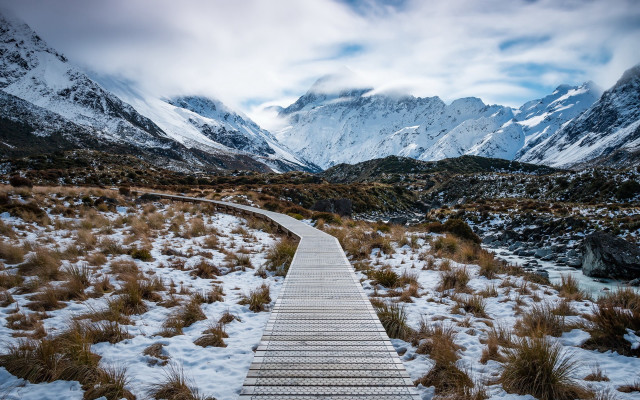 Wooden walkway snowy field mountains free wallpaper for desktop - medium preview image