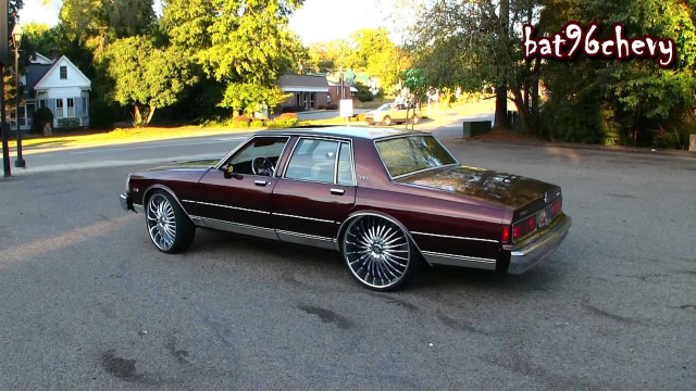 Maroon car parked house trees free wallpaper for desktop - medium preview image