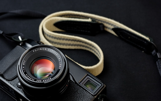 Camera lens black surface strap free wallpaper for desktop - medium preview image