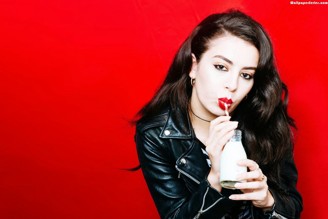 Woman red lipstick holding bottle free wallpaper for desktop - medium preview image