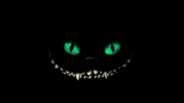 Glowing green cats eyes dark free wallpaper for desktop - medium preview image
