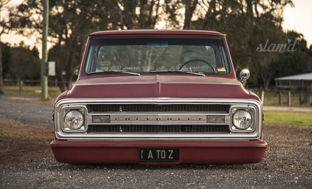 Red truck gravel road forest free wallpaper for desktop - medium preview image