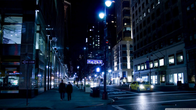City street night couple walking free wallpaper for desktop - medium preview image