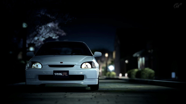 White car parked night lights free wallpaper for desktop - medium preview image