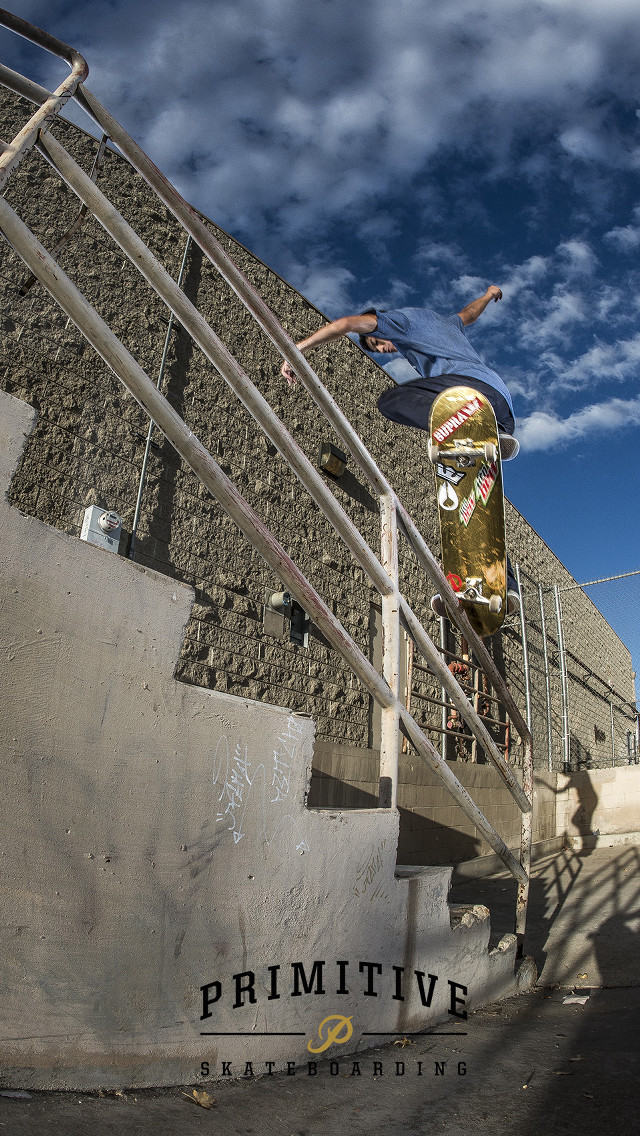 Skateboarder trick rail building sky free wallpaper for mobile - medium preview image