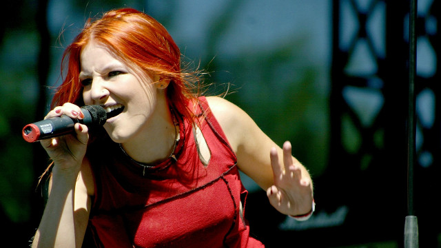 Woman red hair singing microphone #2 free wallpaper for desktop - medium preview image