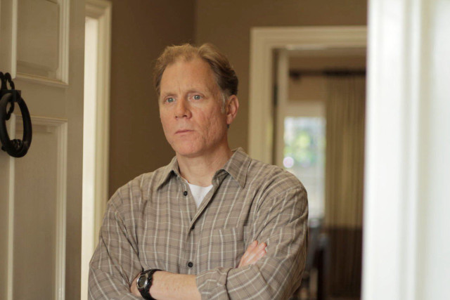 Man standing doorway arms crossed free wallpaper for desktop - medium preview image