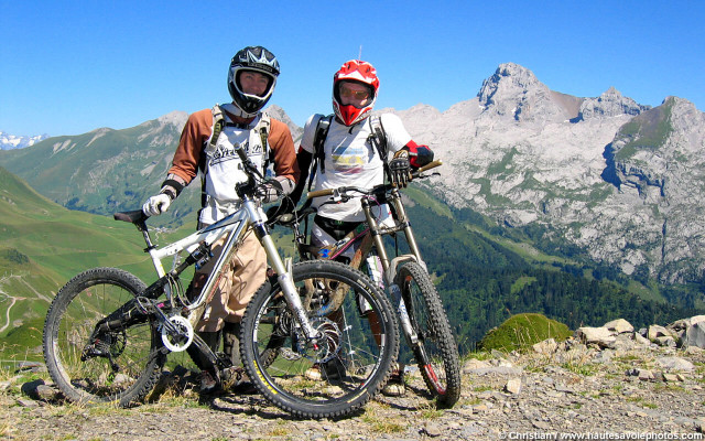 Two people mountain peaks blue free wallpaper for desktop - medium preview image