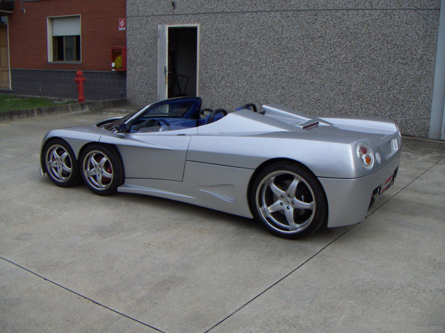 Silver sports car red door free wallpaper for desktop - medium preview image