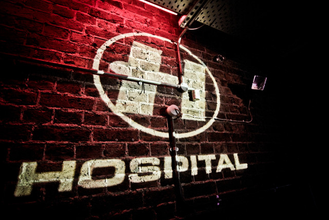 Hospital sign lit brick wall free wallpaper for desktop - medium preview image