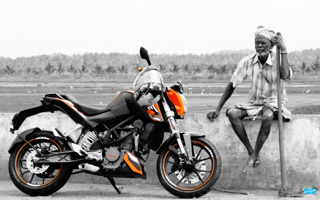 Man sitting wall motorcycle hat free wallpaper for desktop - medium preview image