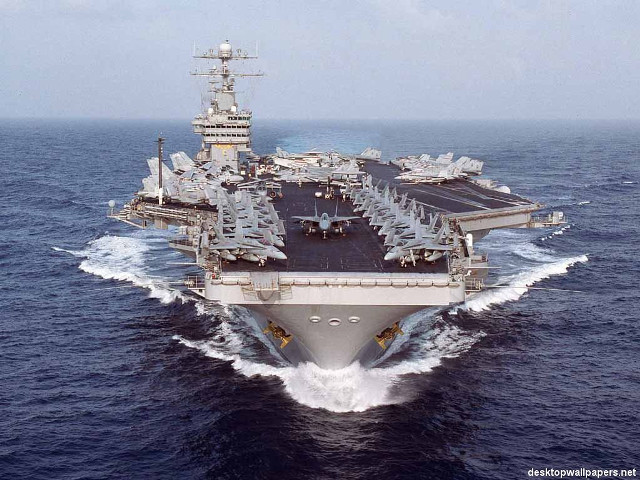 Large warship ocean sunburst clouds free wallpaper for desktop - medium preview image