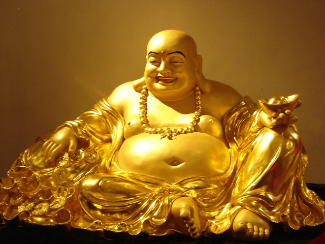Golden buddha statue black table free wallpaper for desktop - medium preview image