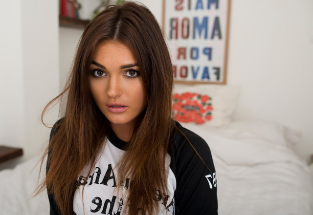 Woman longhair blackshirt bed browneyes free wallpaper for desktop - medium preview image