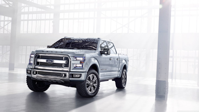 Silver truck parked building light free wallpaper for desktop - medium preview image