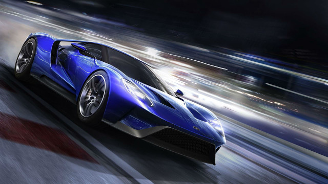 Blue sports car speeding motion free wallpaper for desktop - medium preview image
