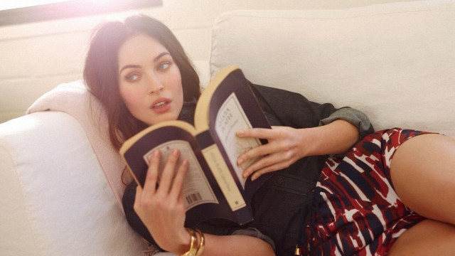 Woman couch reading surprised expression free wallpaper for desktop - medium preview image