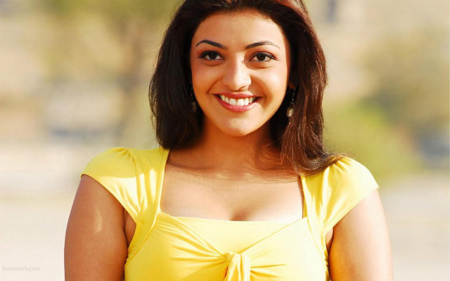 Woman yellow top smiling camera free wallpaper for desktop - medium preview image