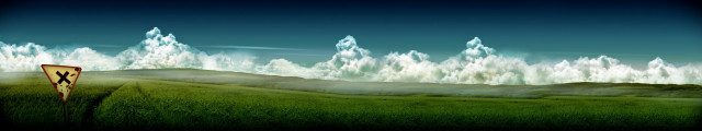 Grassy field sign mountain cloudy free wallpaper for desktop - medium preview image