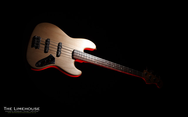 Bass guitar closeup black background free wallpaper for desktop - medium preview image