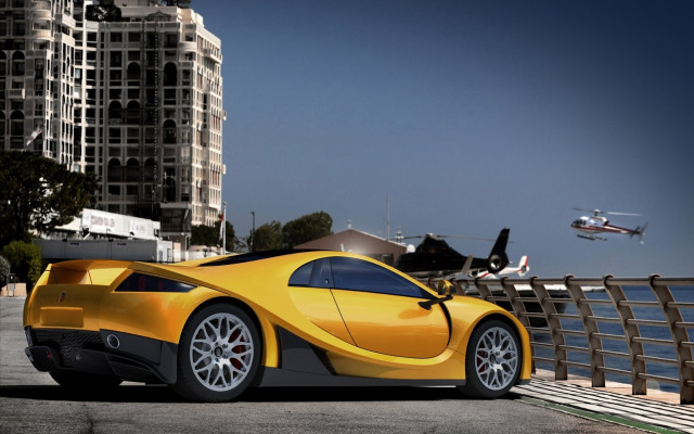 Yellow sports car city road free wallpaper for desktop - medium preview image