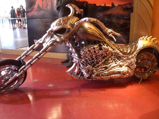 Gold motorcycle museum exhibit people free wallpaper for desktop - medium preview image