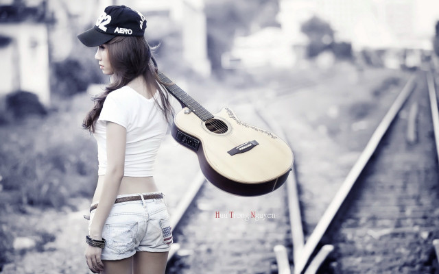 Woman guitar traintrack hat portrait #2 free wallpaper for desktop - medium preview image