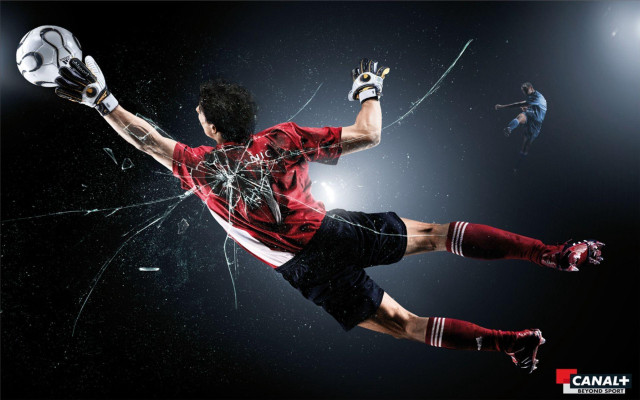 Man kicking soccer ball broken free wallpaper for desktop - medium preview image