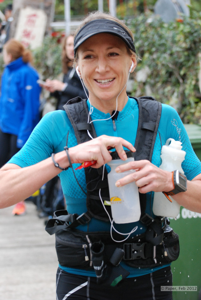 Woman blue shirt black hat free wallpaper for mobile - medium preview image