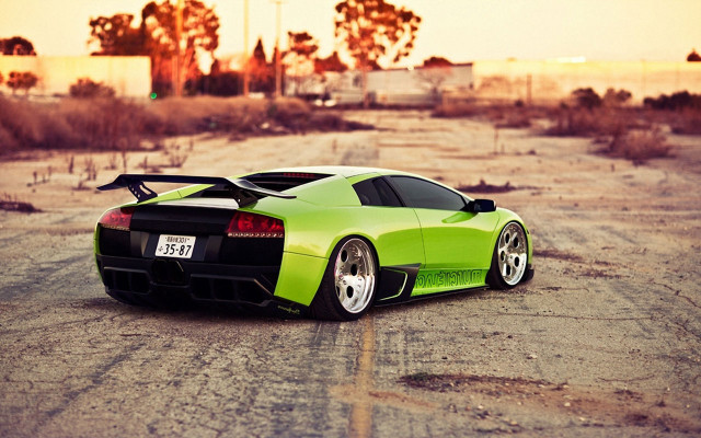 Green sports car desert sunset free wallpaper for desktop - medium preview image