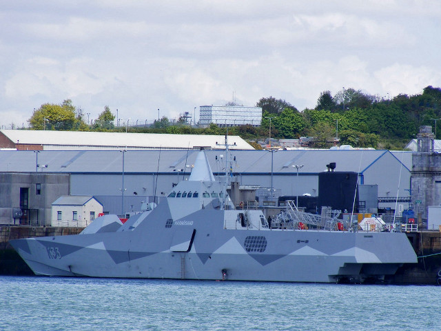 Military ship docked water building free wallpaper for desktop - medium preview image