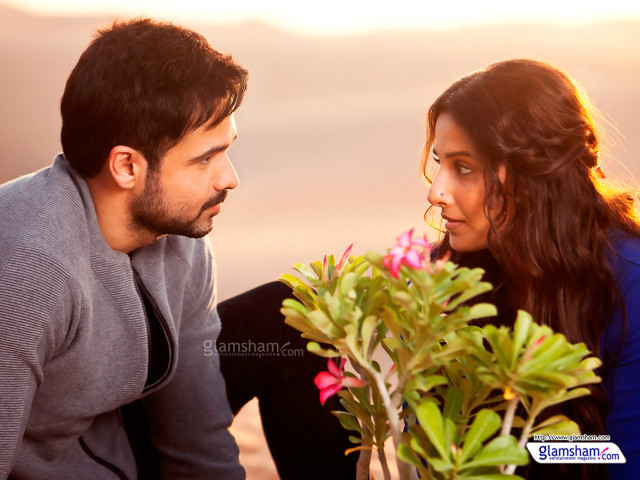 Man woman sitting looking plant free wallpaper for desktop - medium preview image