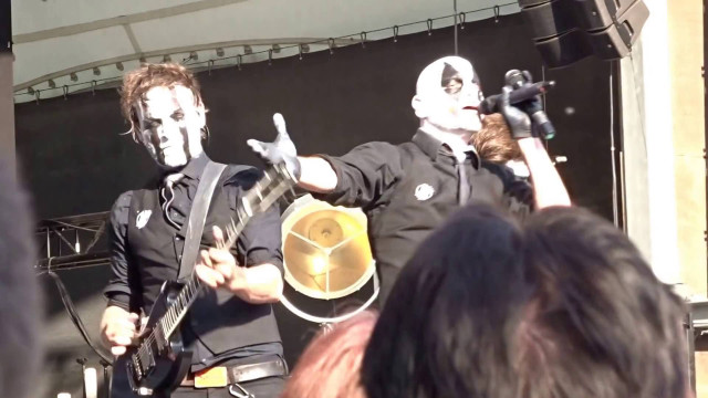 Man guitar mask stage crowd free wallpaper for desktop - medium preview image