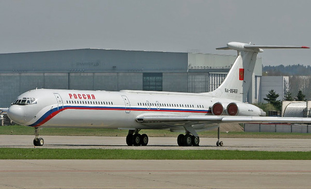 Large white airplane runway building #2 free wallpaper for desktop - medium preview image