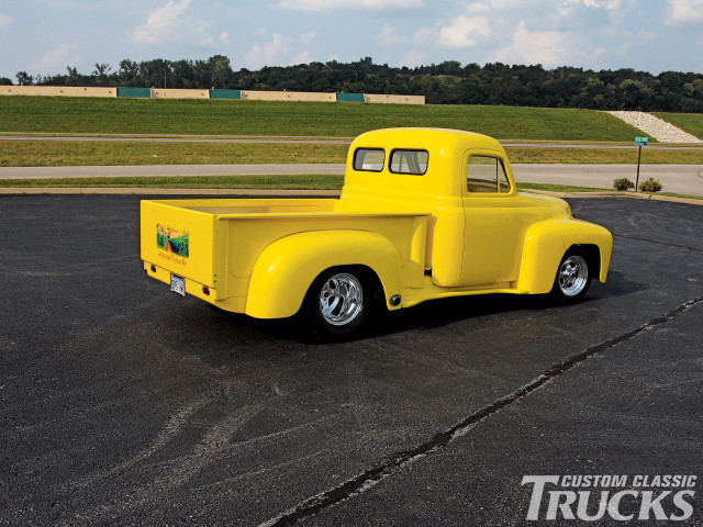 Yellow truck parking lot grass free wallpaper for desktop - medium preview image